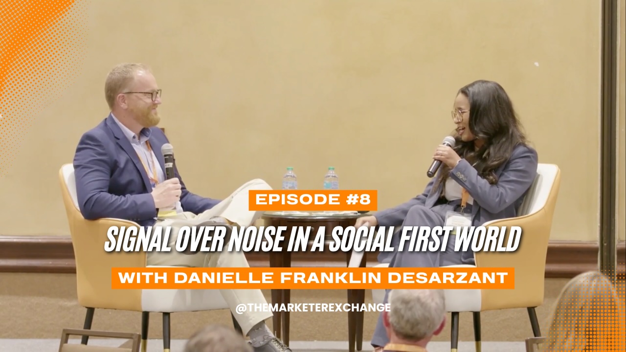 Daniel Franklin Desarzant and Zach Thompson on stage for The Marketer Exchange